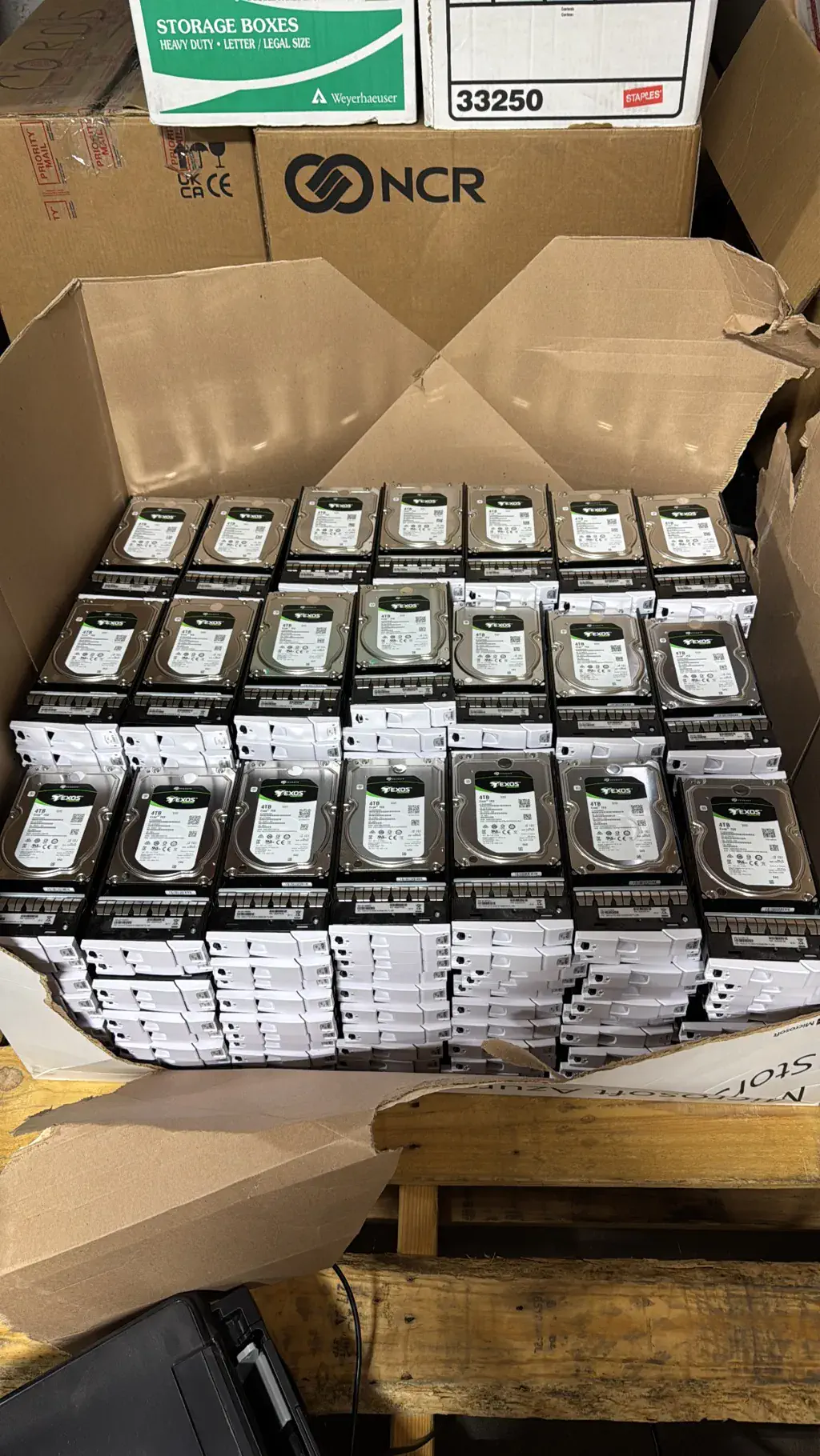 Boxes of computer hard drives waiting for data destruction