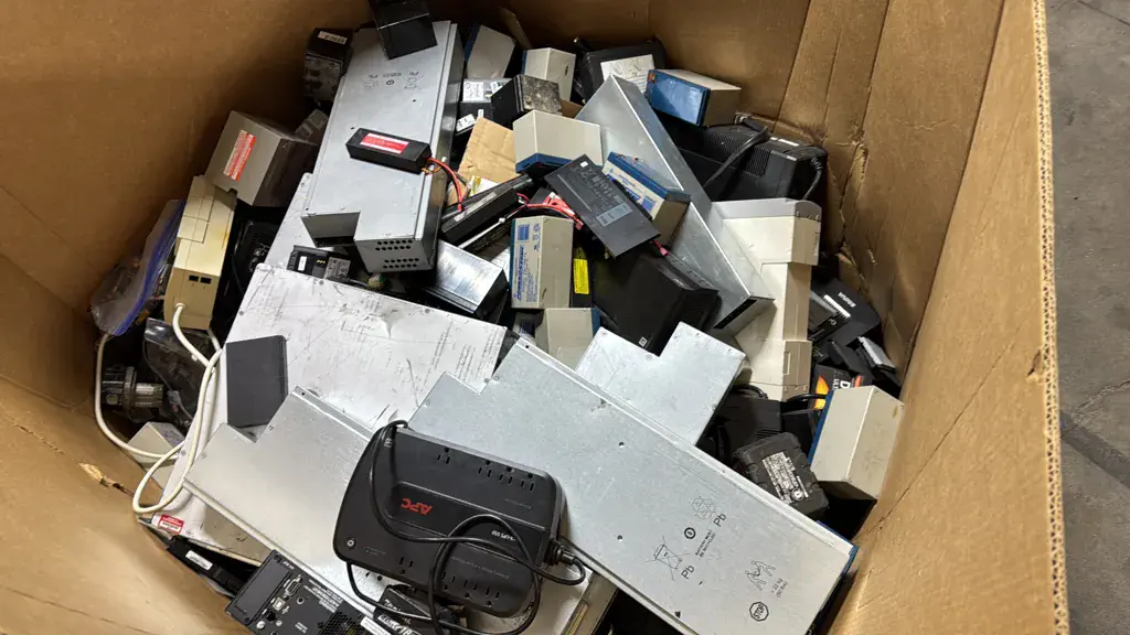 A box of UPS batteries and power modules