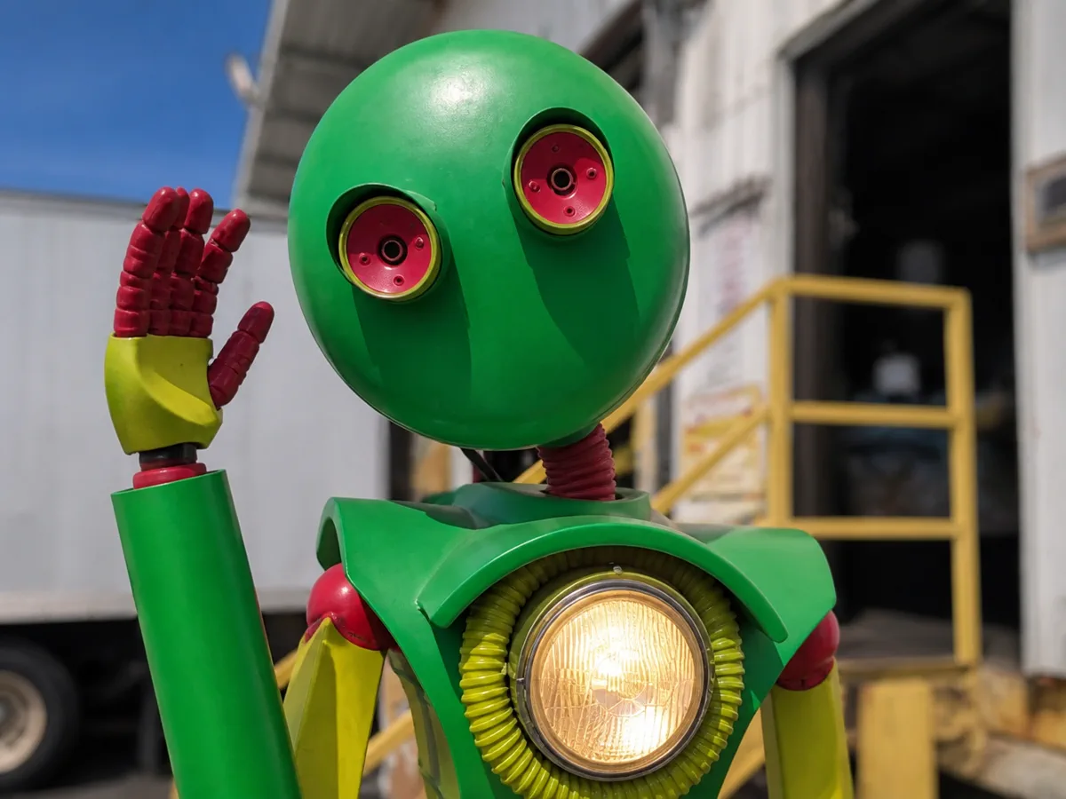 Henry the Computer Recycling LLC mascot waving hello at the North Kansas City drop-off dock